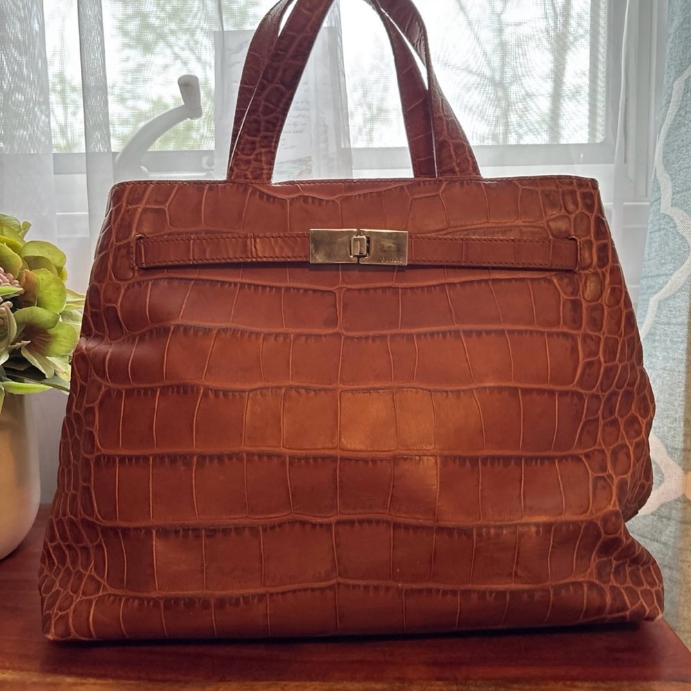 Pre-loved brown crocodile-embossed Furla hand bag.